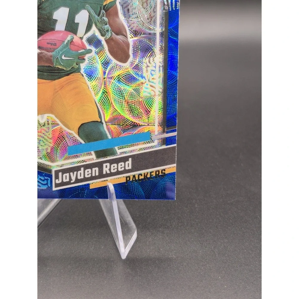 2023 Donruss Optic Jayden Reed #334 Rated Rookie Blue Scope Prizm SP Green Bay